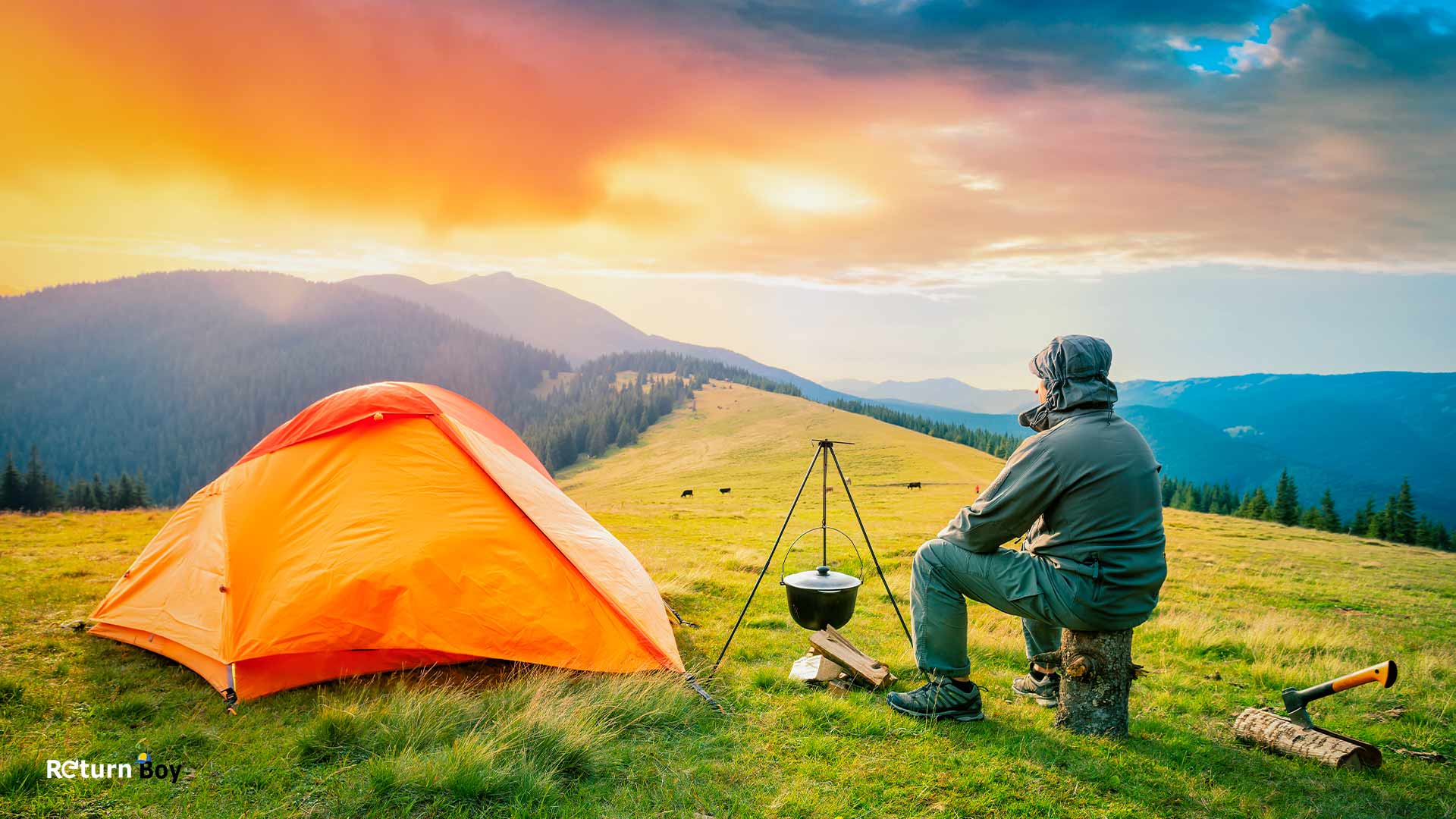 A man camping in the top of mountain using alpkit products